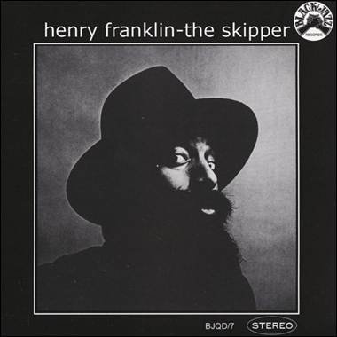 A person with a beard and a hat
Description automatically generated