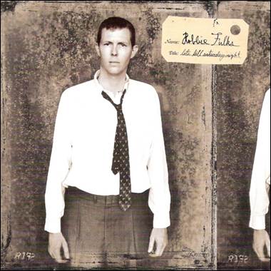 A person in a white shirt and tie

Description automatically generated