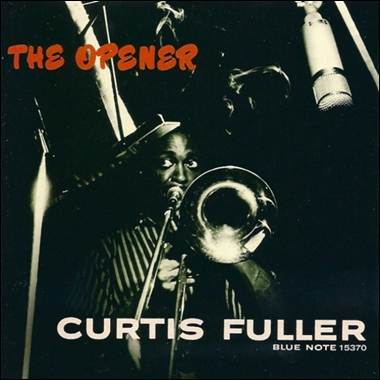 A person playing a trumpet
Description automatically generated