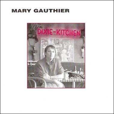 A person sitting at a table
Description automatically generated