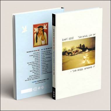 A book with a picture of a person and a bird
Description automatically generated