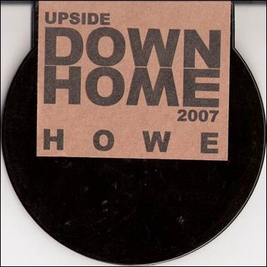 A brown paper with black text on a black circle
Description automatically generated