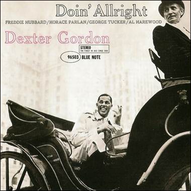 A person in a horse carriage
Description automatically generated