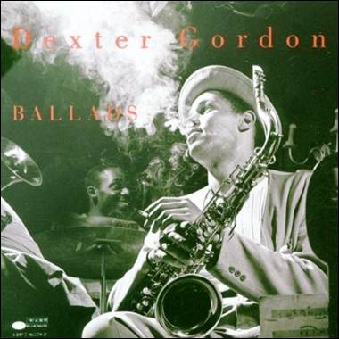 A person playing a saxophone
Description automatically generated