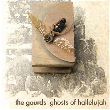 A bee on a wooden box
Description automatically generated