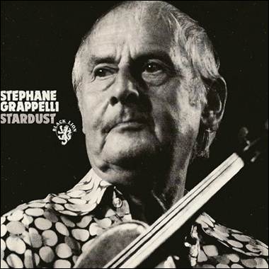 A person holding a violin
Description automatically generated