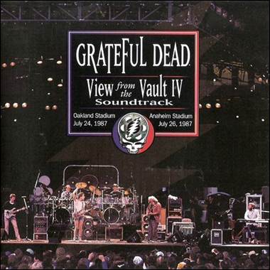 A band on stage with a crowd watching

Description automatically generated