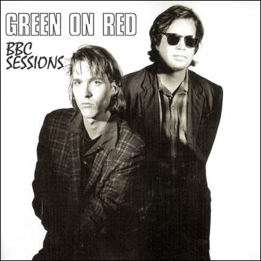 A couple of men posing for a picture
Description automatically generated