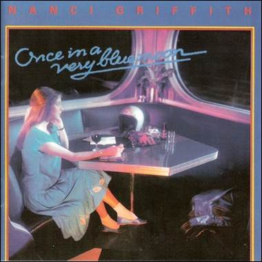 A person sitting at a table
Description automatically generated