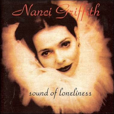 A person with dark hair and a white fluffy collar
Description automatically generated