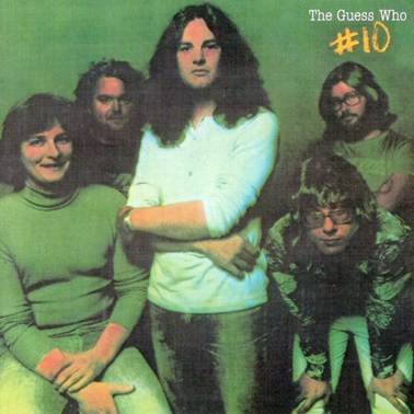 A group of people posing for a photo
Description automatically generated