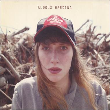 A person wearing a baseball cap
Description automatically generated