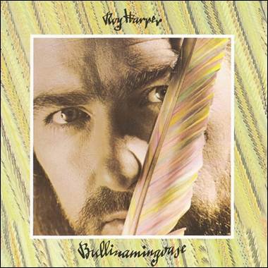 A person with a feather in his mouth
Description automatically generated