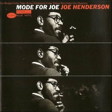 A person smoking a cigarette
Description automatically generated