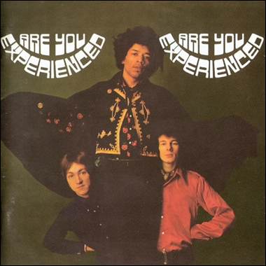 A group of men posing for a picture
Description automatically generated