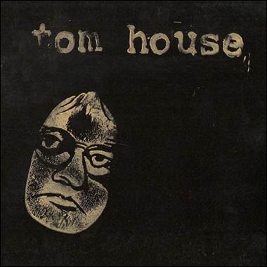 A black and white cover with a face
Description automatically generated