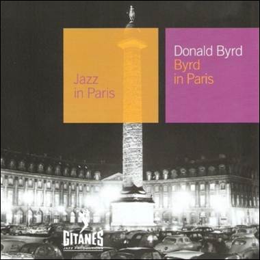 A large monument in front of a building
Description automatically generated