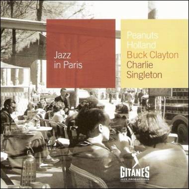 A group of people sitting outside
Description automatically generated