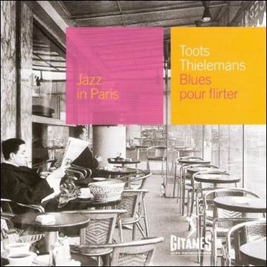 A person sitting at a table
Description automatically generated