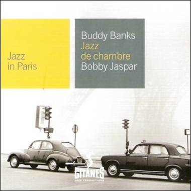 A black car next to a black car
Description automatically generated