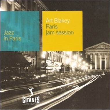 A city street with buildings and cars
Description automatically generated with medium confidence