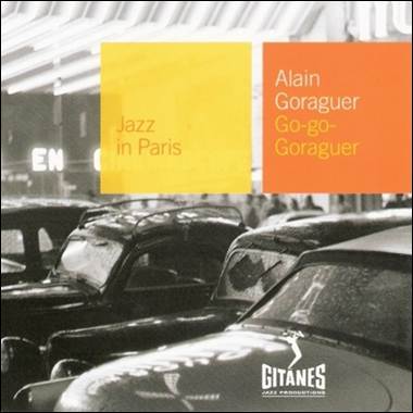 A group of cars in a street
Description automatically generated