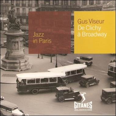 A group of cars on a street
Description automatically generated