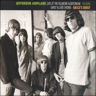 A group of people posing for a photo
Description automatically generated