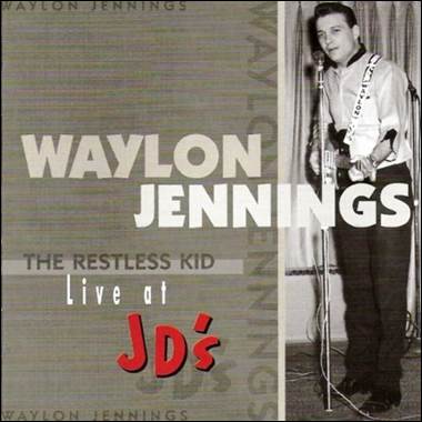 A person standing in front of a microphone
Description automatically generated