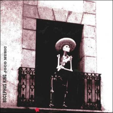 A skeleton sitting on a balcony
Description automatically generated