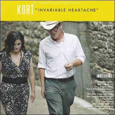 A person and person walking down a sidewalk

Description automatically generated