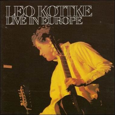 A person playing a guitar
Description automatically generated