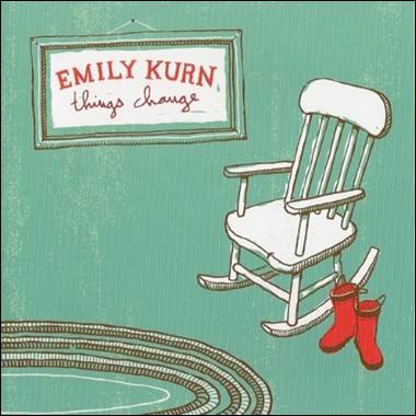 A rocking chair and red boots
Description automatically generated