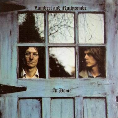 A group of men looking out a window
Description automatically generated