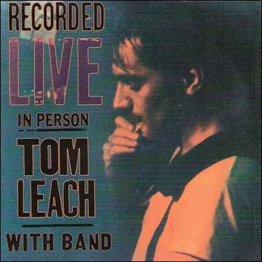 A person with his hand to his mouth
Description automatically generated