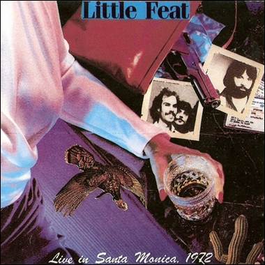 A hand holding a glass of liquid
Description automatically generated