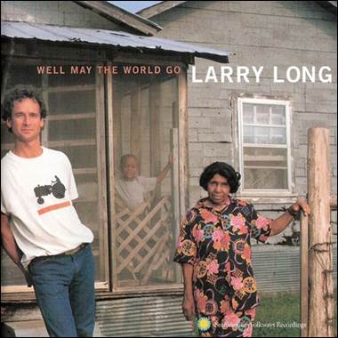 A person and person standing in front of a house
Description automatically generated