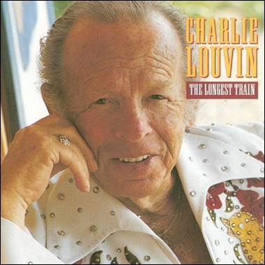 A person with his hand on his face

Description automatically generated