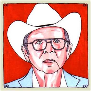 A person wearing a cowboy hat
Description automatically generated