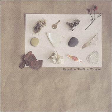 A collection of objects on a white surface
Description automatically generated