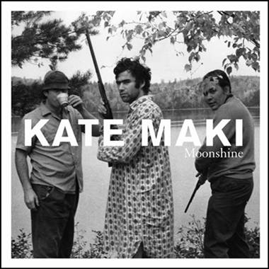 A group of people standing next to a body of water
Description automatically generated