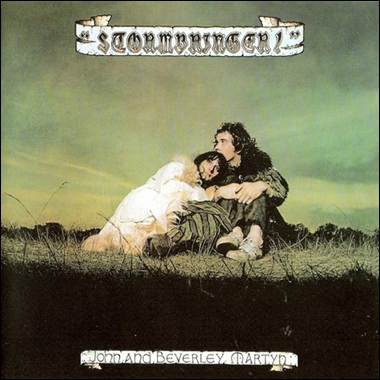 A person and person sitting on grass
Description automatically generated