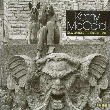 A person sitting on a stone statue with a dog

Description automatically generated