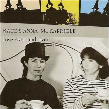 A couple of women sitting in a chair
Description automatically generated