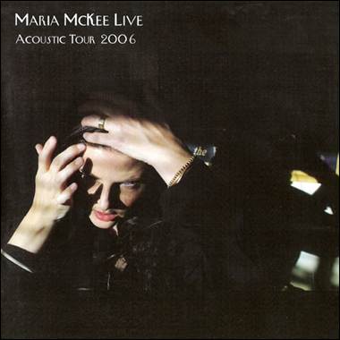 A person holding her head
Description automatically generated