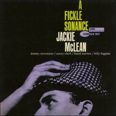 A person with a hat on a cover
Description automatically generated