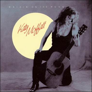 A person sitting on a guitar
Description automatically generated