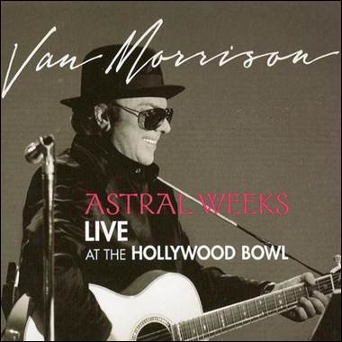 A person holding a guitar

Description automatically generated