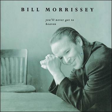 A person leaning on a table
Description automatically generated