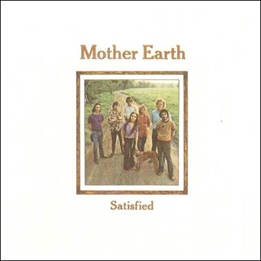 A group of people posing for a photo
Description automatically generated